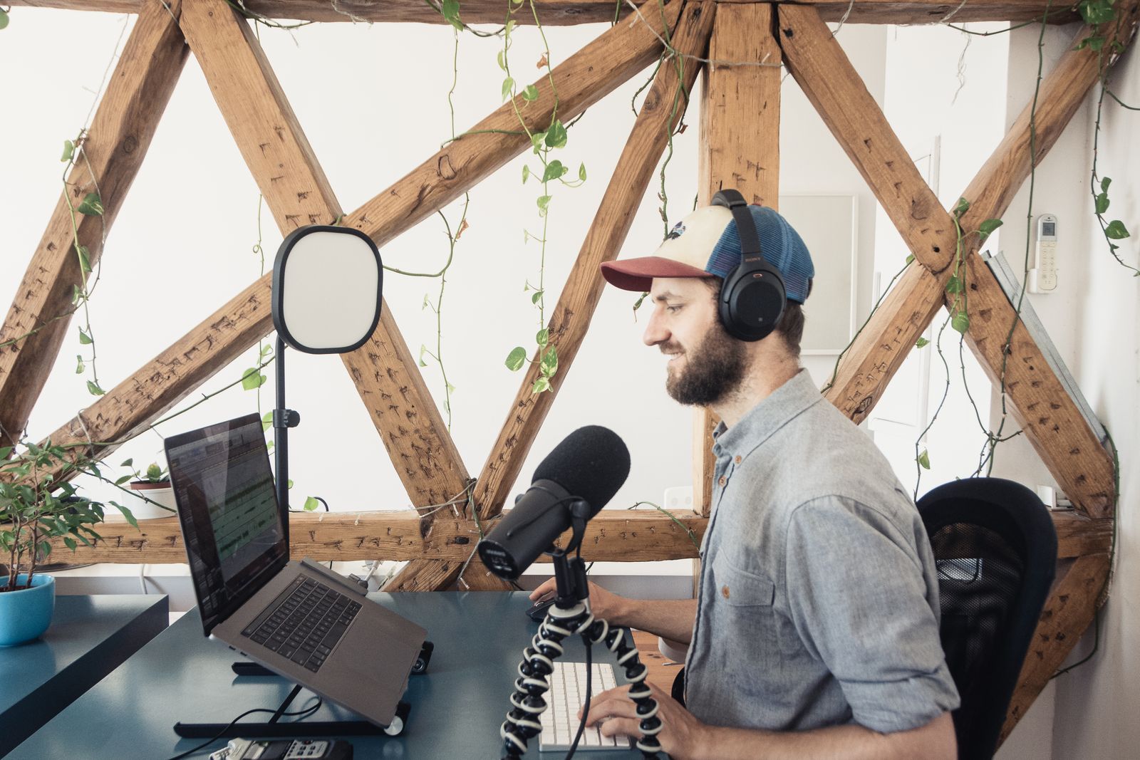 A laptop open to a local news article layout in a Liberty Village studio